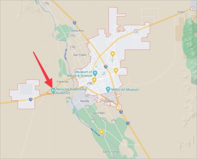 A map with a red arrow pointing to the Recycled Roadrunner Sculpture landmark.